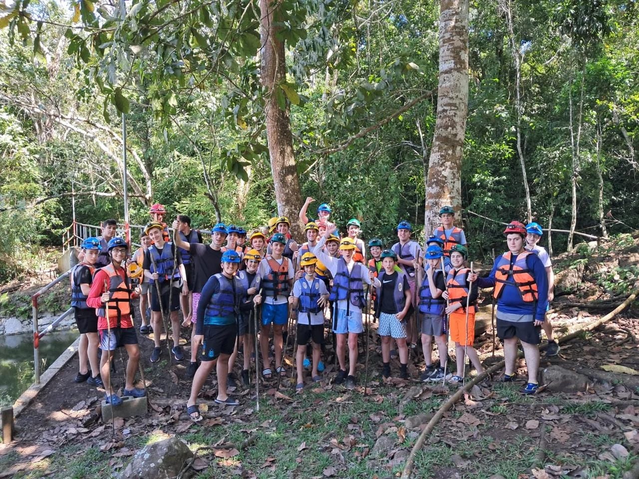 Our past program’s group ready for an outdoor adventure with helmets and life jackets